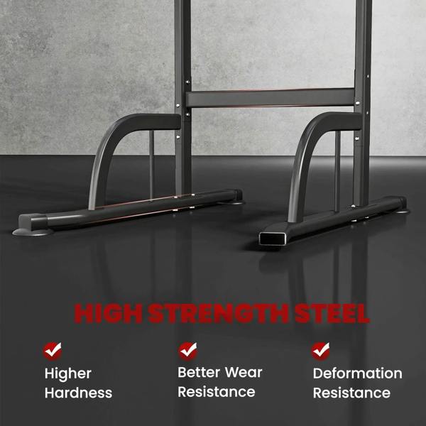 Black power tower dip station showing wide base and curved handle frames