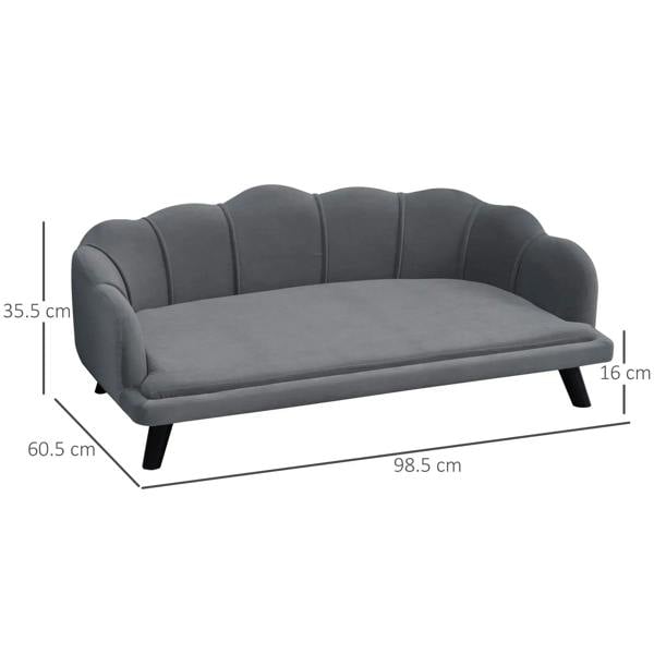 Grey dog couch with tufted backrest, thick seat cushion, and short angled legs