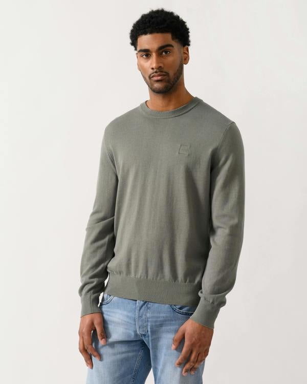 model wearing a BOSS Orange Kanovano Mens Crew Neck Jumper in Open Grey 076