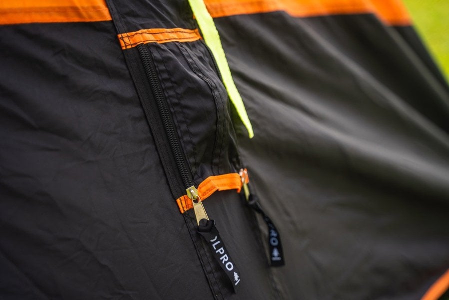 A valve cover on the Discovery inflatable Tent OLPRO in the standout out Black & Orange Colourway