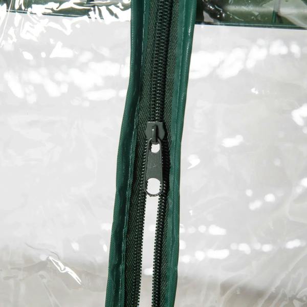 Green zipper track on the greenhouse door panel