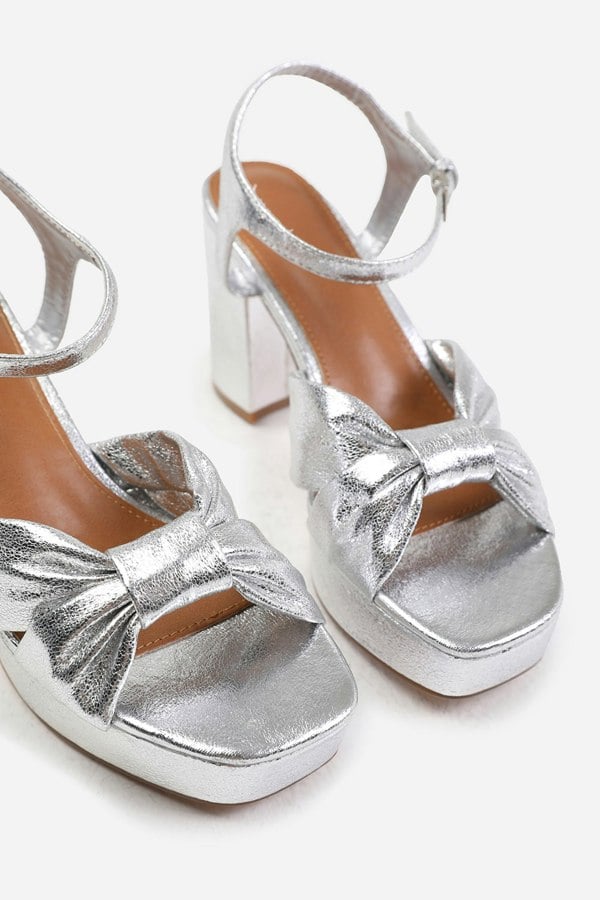 Where's That From Talia Wide Fit Mid Block Heel With Plaftorm and Bow Detailing in Silver Faux Leather