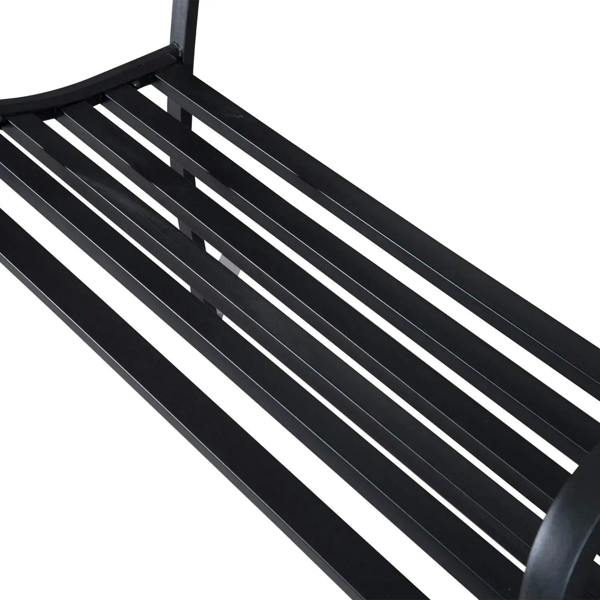 Close-up of black slatted bench seat and metal frame rails