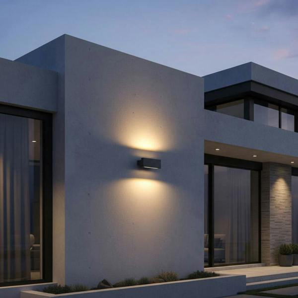 black up and down light mounted on the exterior white wall of an ultra modern house