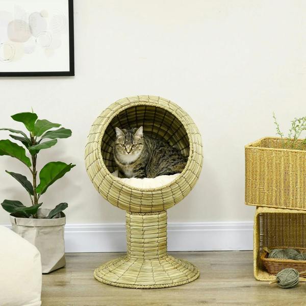 Natural yellow raised cat house bed with circular entrance and cream cushion