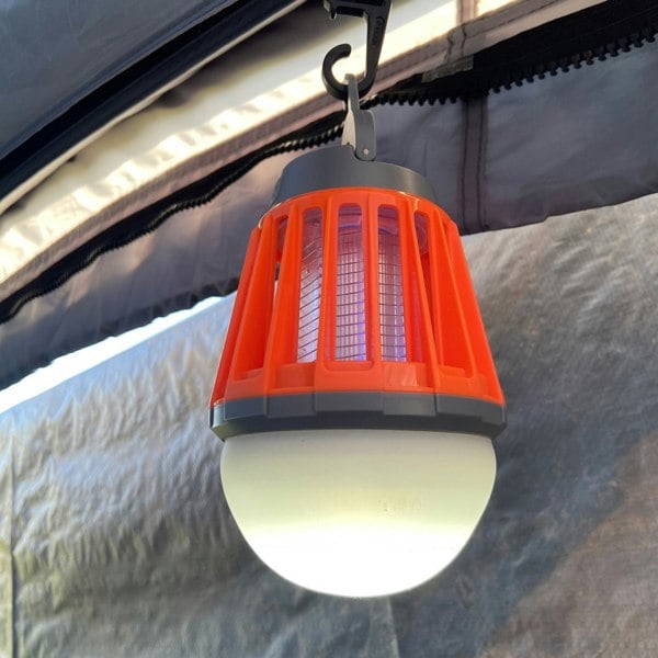 Image of OLPRO Mosquito Killer Lantern on a white background, hung inside a tent/awning.