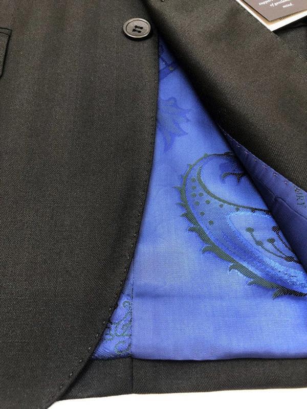 Zoomed in poly-viscose, wool blend material - Pamoni