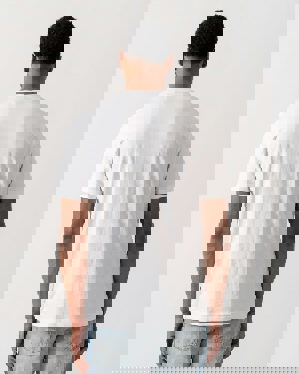 Model wearing BOSS Orange Dobermann Graphic T-Shirt in White 100 - back