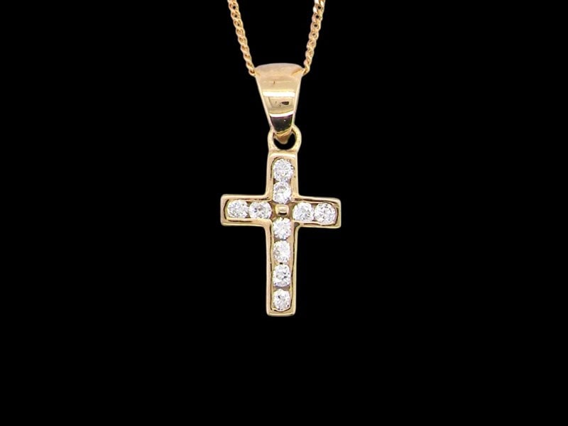 Vintage Tom A 9 carat gold cubic zirconia cross