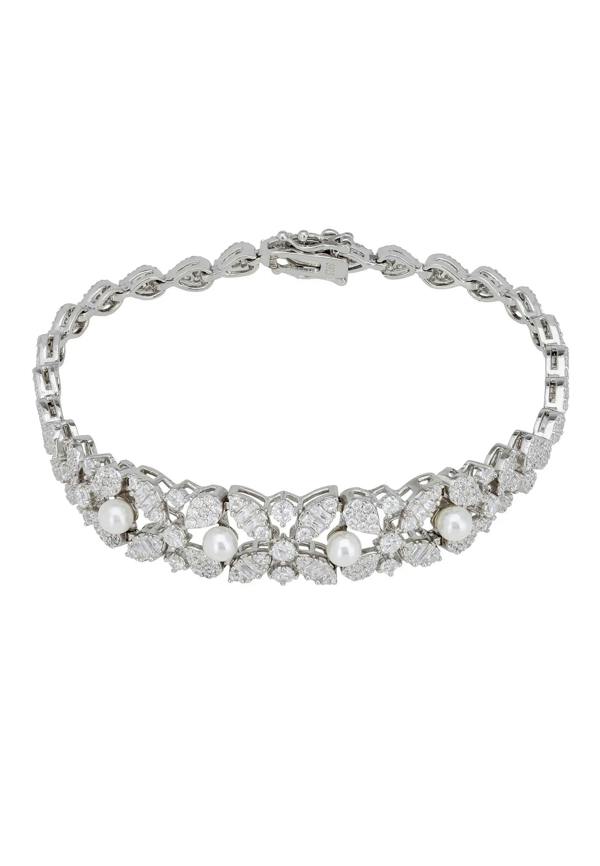 Floral diamond bracelet with pearls.