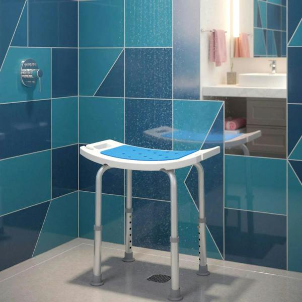 Adjustable-height shower stool with blue perforated seat in a shower area