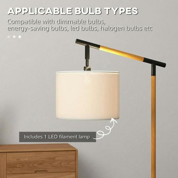 Brown floor lamp with cream drum shade and adjustable black mounting bracket