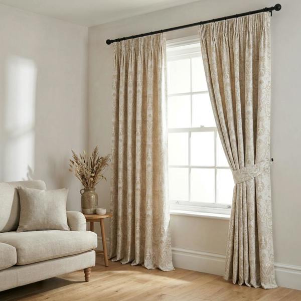 Tegola made-to-measure curtains in Natural, styled in a living room