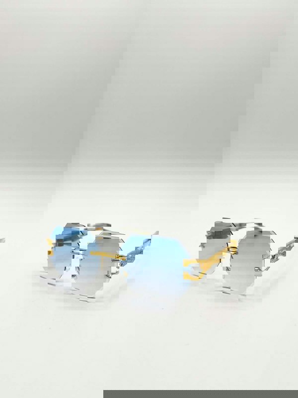 SVNX Rimless Oval Geometric Sunglasses in Gold Blue