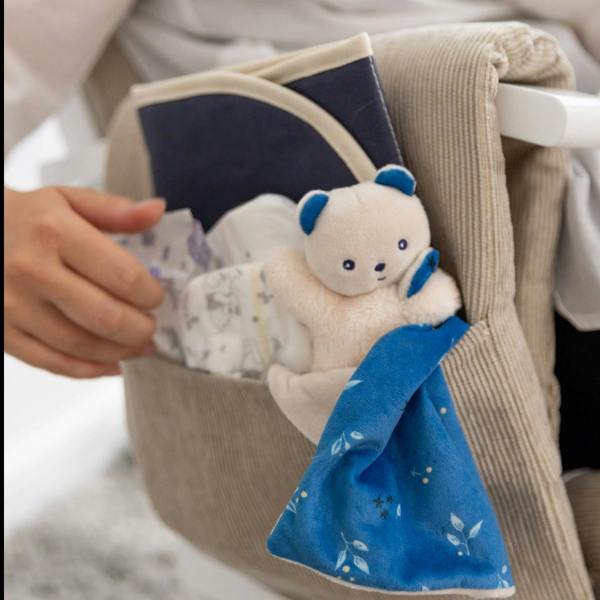 Glider nursing chair with storage pockets