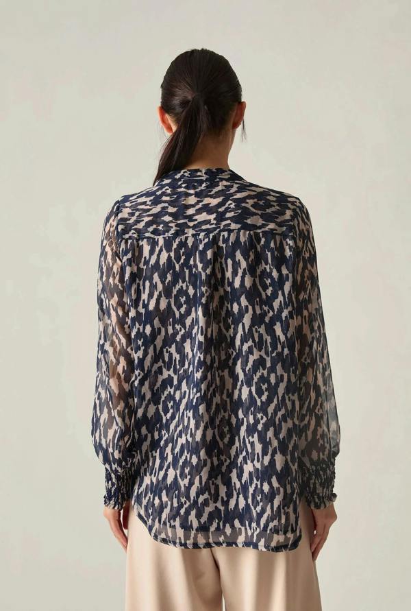 Navy abstract blouse on ghost mannequin back view long sleeve fit