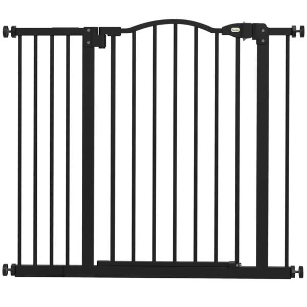 Black pet safety gate with vertical bars and hinged frame for door opening