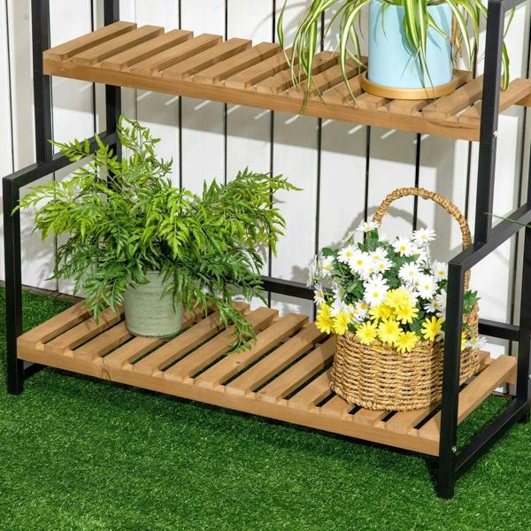 3-tier plant stand with light wood shelves, black frame holding potted plants and flowers