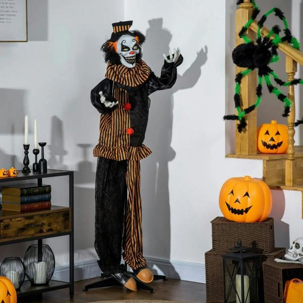 Circus clown animatronic decoration standing upright in striped outfit, hands raised