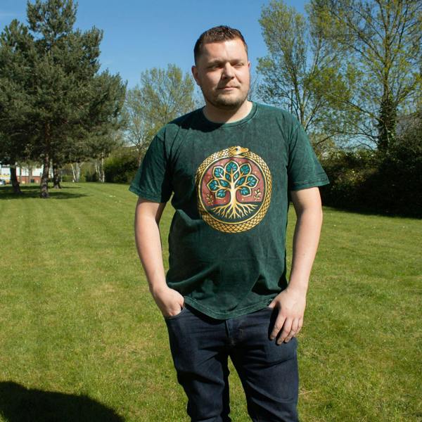 Green stonewashed cotton t-shirt with Tree of Life emblem graphic on the chest
