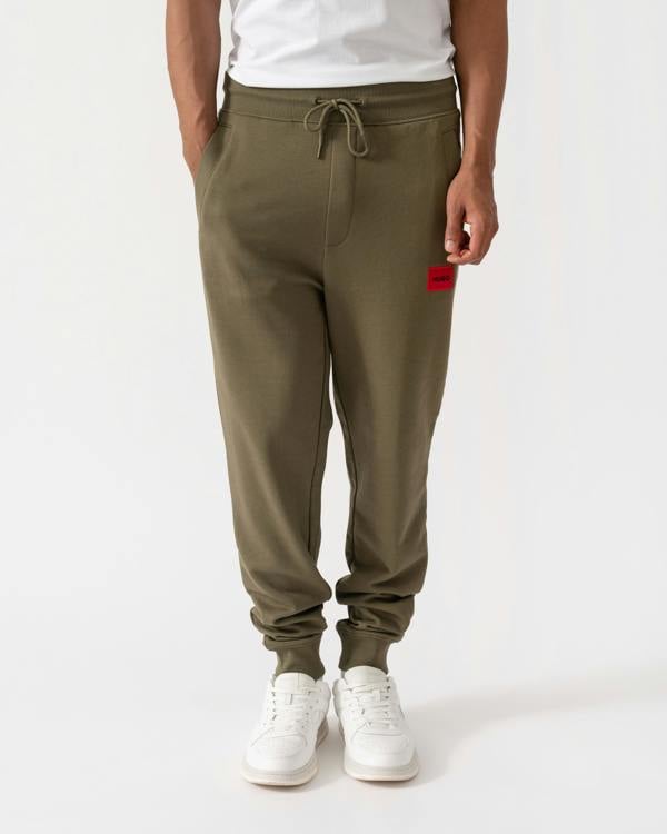 Front shot of HUGO Doak212 Mens Joggers - Open Green 389