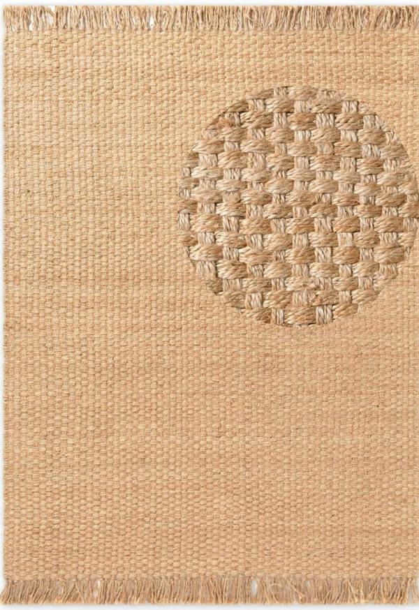 Beige woven rug with a circular pattern and fringed edges