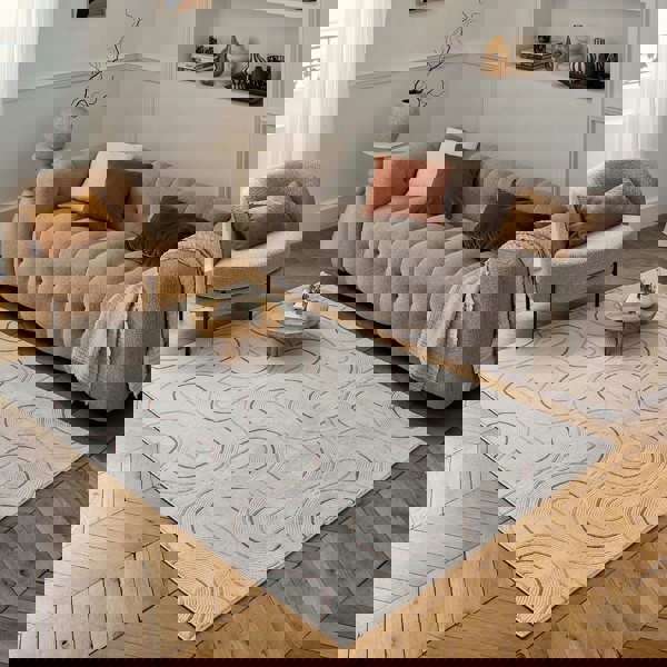 Living Room rug, terra-cream colours, geometric, practicality in mind, the rug is anti-allergic.