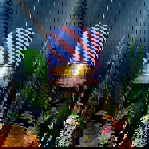 love frankie Helter Skelter lampshade in peach fuzz with gold lining and fringing