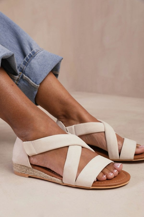 Where's That From Hummingbird Extra Wide Fit Low Wedge Shoes With Cross Over Strap in Light Cream Suede