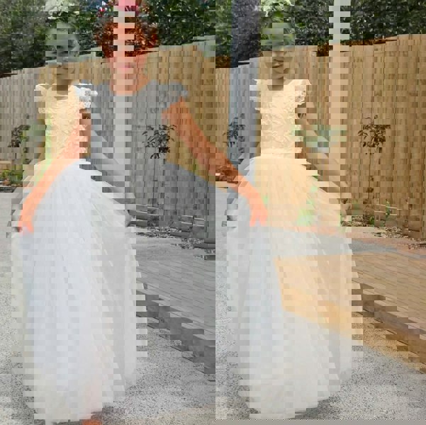 pretty girl in a long white dress