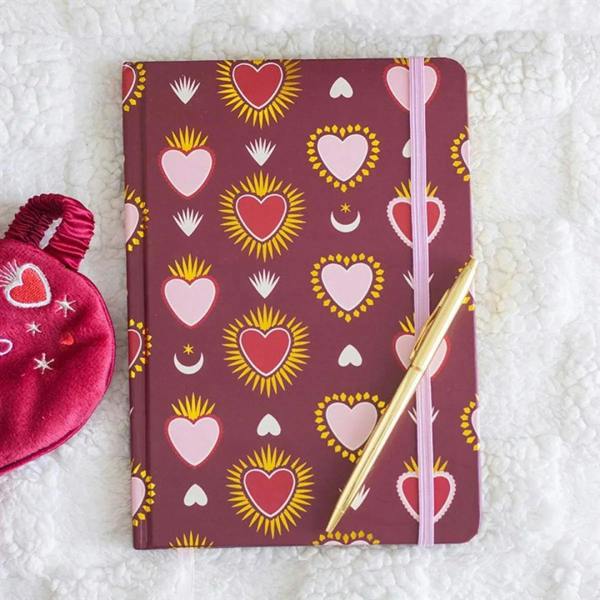 Sacred Heart print A5 notebook with maroon heart pattern and pink elastic closure
