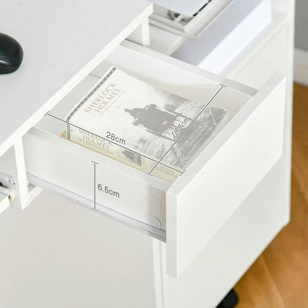 White drawer with transparent front panel and visible storage inserts