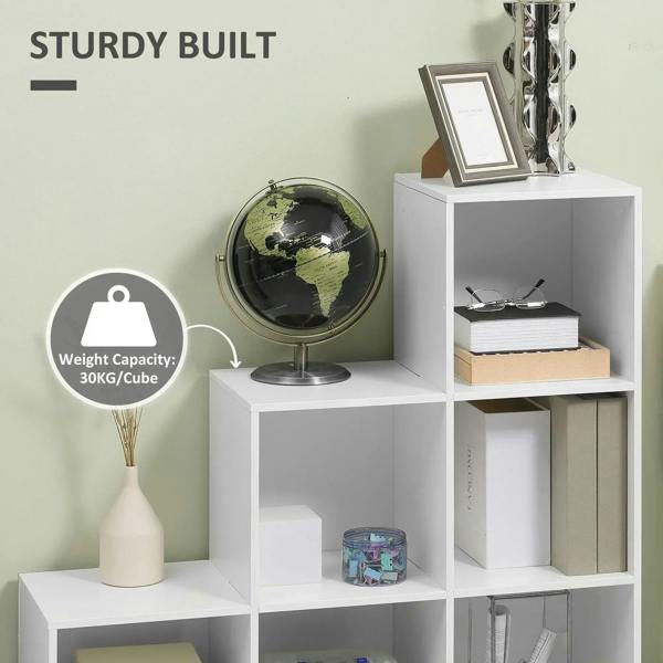 White step storage cabinet with open cubbies and top shelves for decor