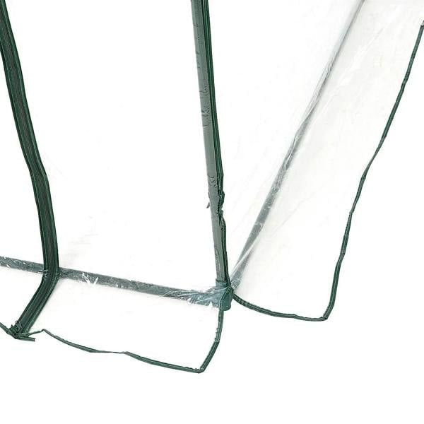 Clear PVC greenhouse corner with reinforced seams and arched steel support frame