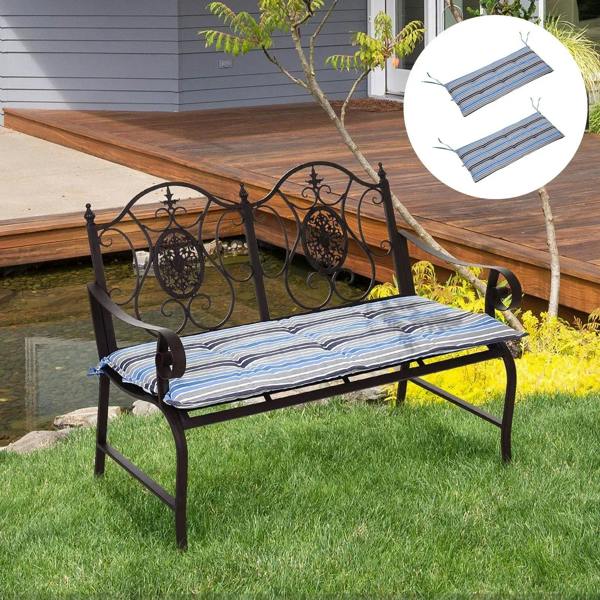 Bench cushion with blue and gray stripe cover and corner ties for secure fastening