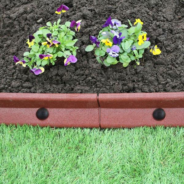 Flexible terracotta lawn edging, 1.2m long, with smooth texture, showcasing vibrant flowers and rich soil against green grass