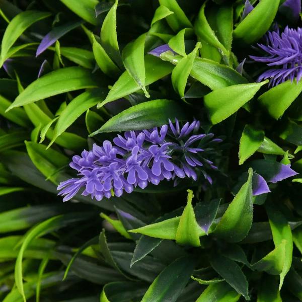 Close-up of artificial lavender flower ball with green leaves and purple blossoms