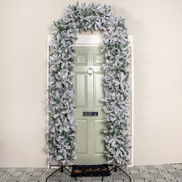 Samuel Alexander 8ft (2.52m) Slimline Single Door Artificial Snow Flocked Christmas Tree Arch in Green with 2000 Tips