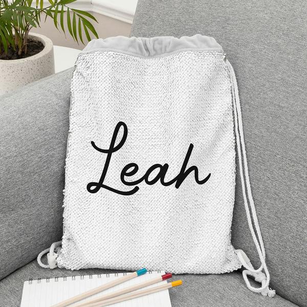 Personalised silver sequin drawstring bag for kids custom printed with the name Leah.
