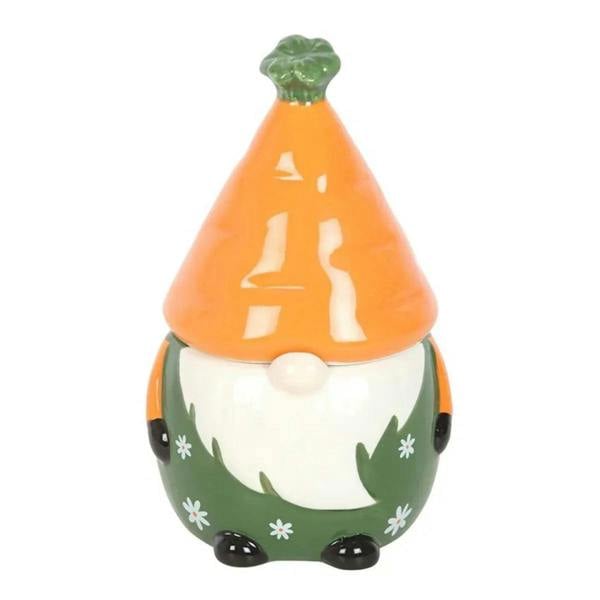 Orange and green ceramic oil burner with white centerpiece and small flower accents