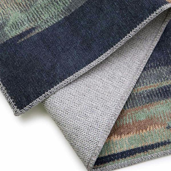 Close-up of a textured fabric with a patterned design on a white background