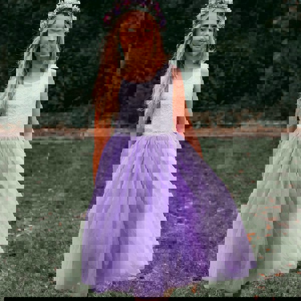 young girl wearing lilac flower girl dress