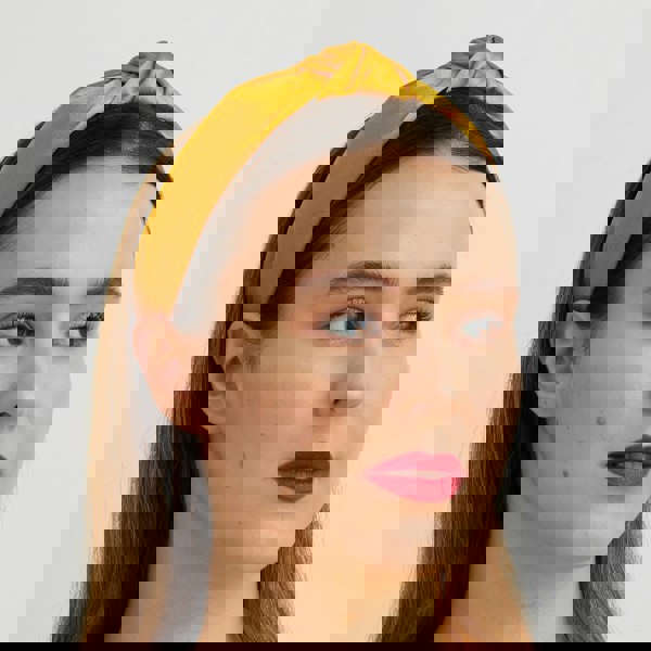 gold knot headband for wedding guest with hair down