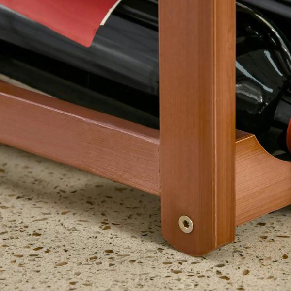 Bottom corner of brown bamboo wine rack with sturdy base and screw fastener