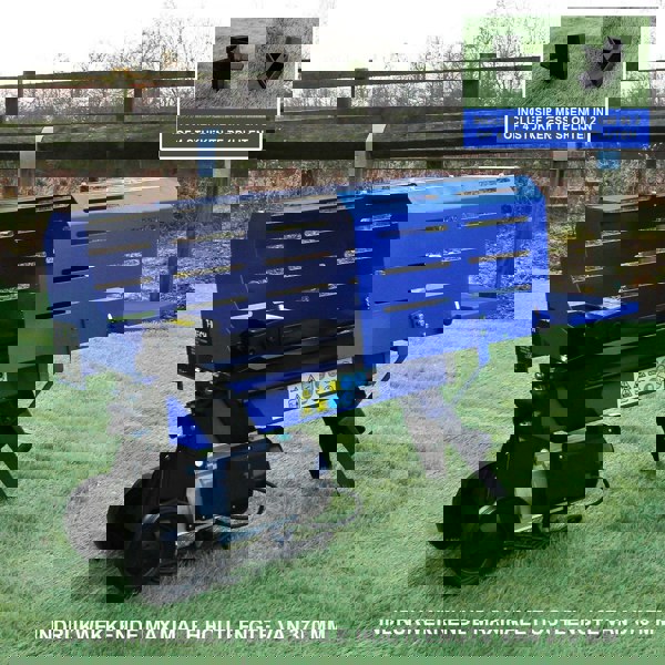 T-Mech 5T log splitter in vibrant blue, featuring a sturdy design, wheels for mobility, and a 370mm splitting capacity on a grassy background