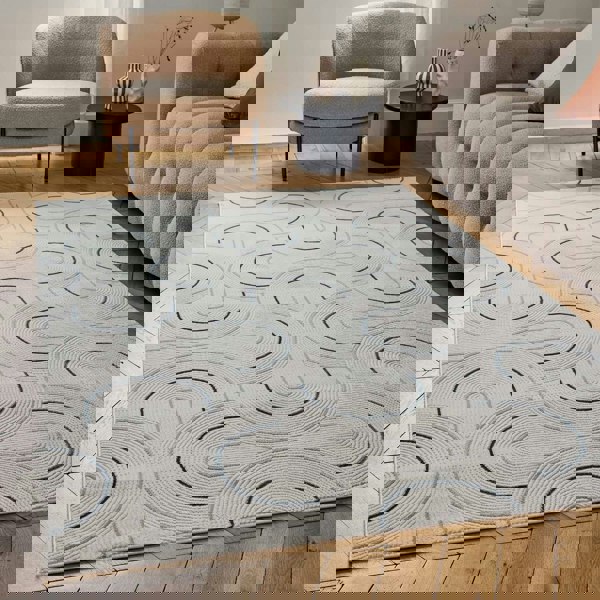 Living Room rug, blue-cream colours, geometric, practicality in mind, the rug is anti-allergic.