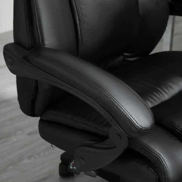 Black PU leather padded armrest and seat cushion on a swivel office chair