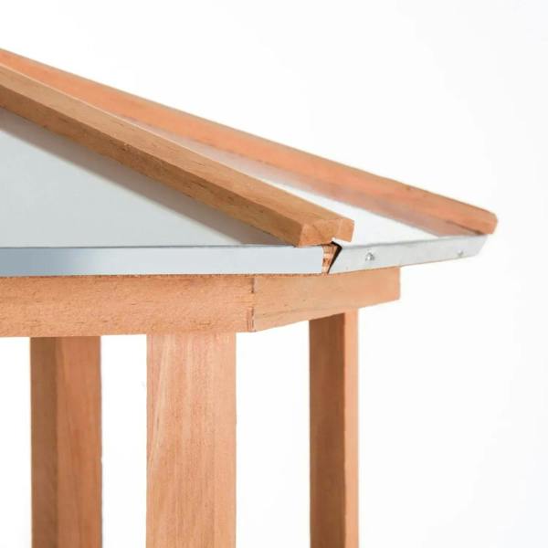 Wooden bird feeding table roof edge detail, natural wood gazebo top.