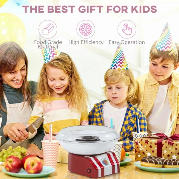 Red and white cotton candy machine on table with clear dome for making candy floss