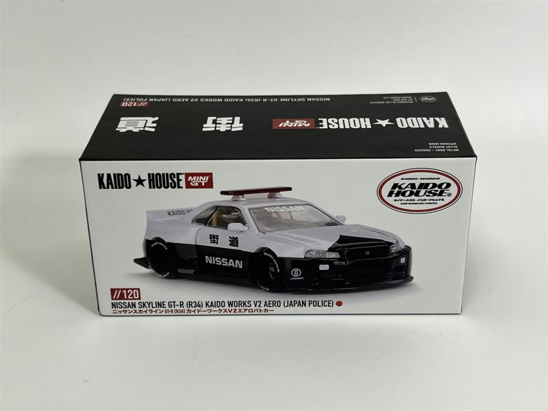 Mini GT Nissan Skyline GTR R34 Kaido Works V2 Aero Japan Police 1:64 Mini GT KHMG120